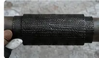 Illustrative application of fiberglass repair wrap around a cable