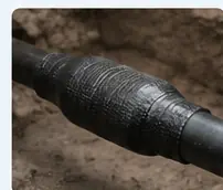 Illustrative close-up of a wrapped cable repair