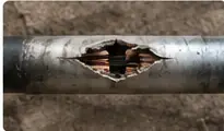 Illustrative damaged cable sheath before repair